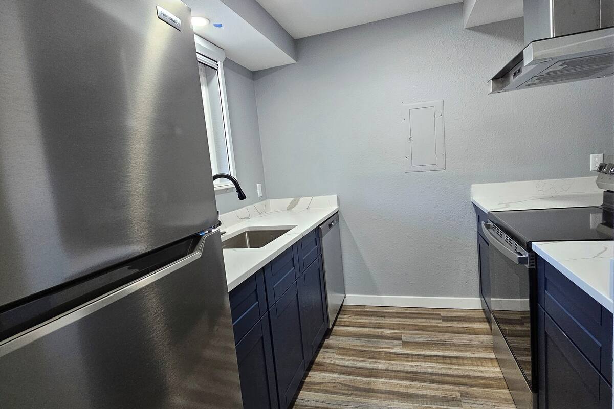 full-sized fridge, microwave, dishwasher, coffee/tea maker