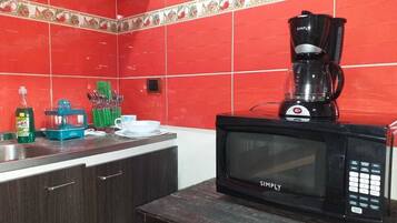 Standard Apartment, 2 Bedrooms, City View | Private kitchenette | Fridge, microwave, oven, stovetop