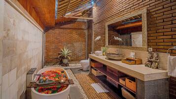 Combined shower/bathtub, hair dryer, towels, soap