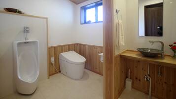 Combined shower/tub, hair dryer, towels, soap