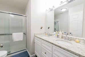 Bathtub, hair dryer, towels, soap