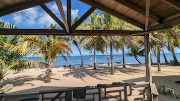 On the beach, sun-loungers, beach towels