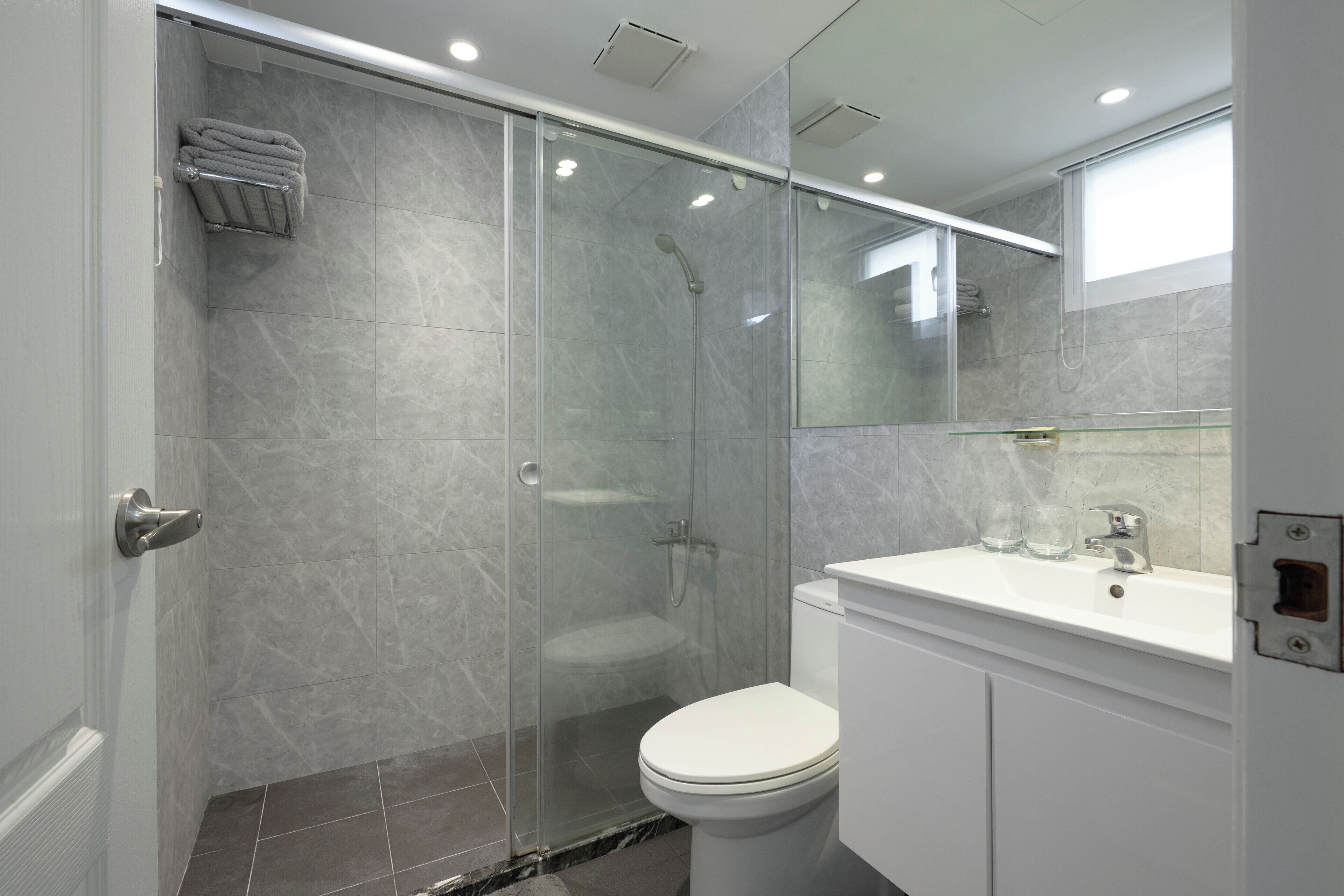Shower, hair dryer, towels, soap