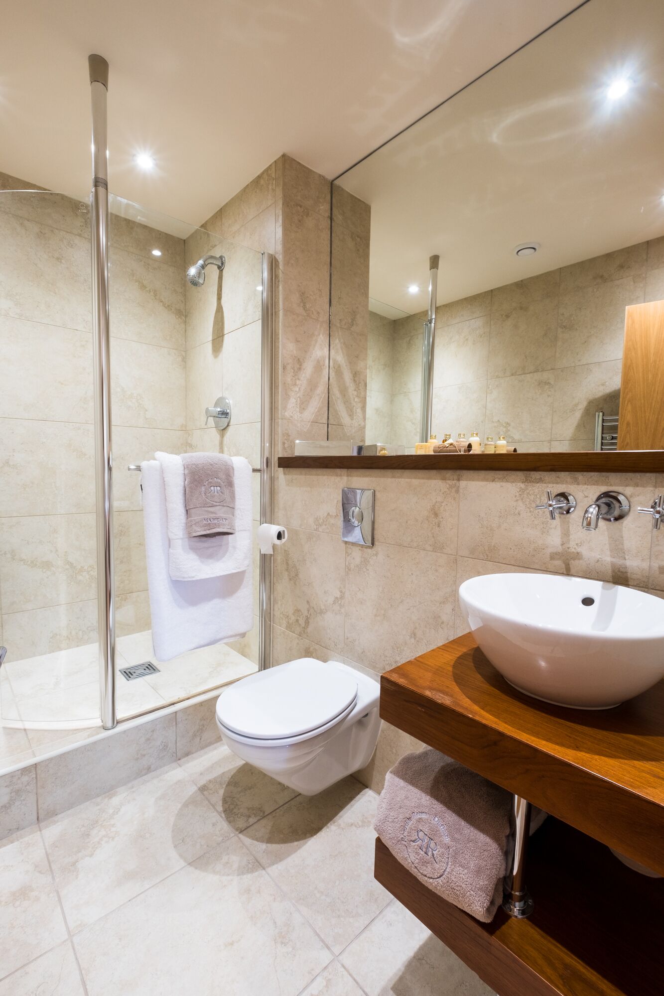 Combined shower/tub, hair dryer, towels, soap