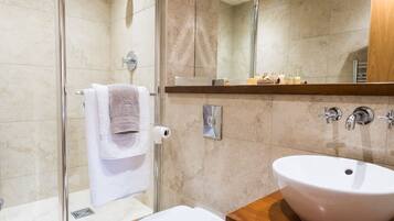 Combined shower/tub, hair dryer, towels, soap