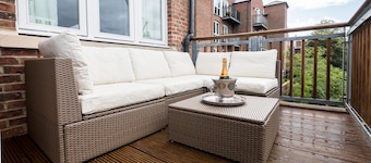 Award winning apartment, central and riverside with terrace and free car parking