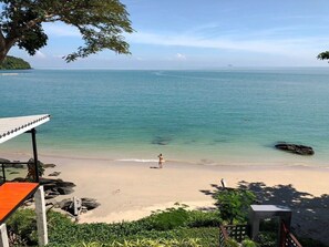 On the beach, sun-loungers, beach towels