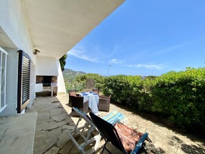 Outdoor dining - Villenpark Playa Arena House Palmera (Lloret de Mar)