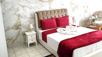 1 slaapkamer, een strijkplank/strijkijzer, beddengoed