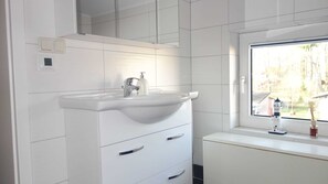 Douche, sèche-cheveux