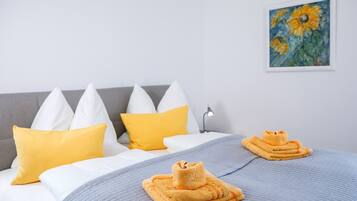 2 dormitorios, sistema de insonorización, tabla de planchar con plancha