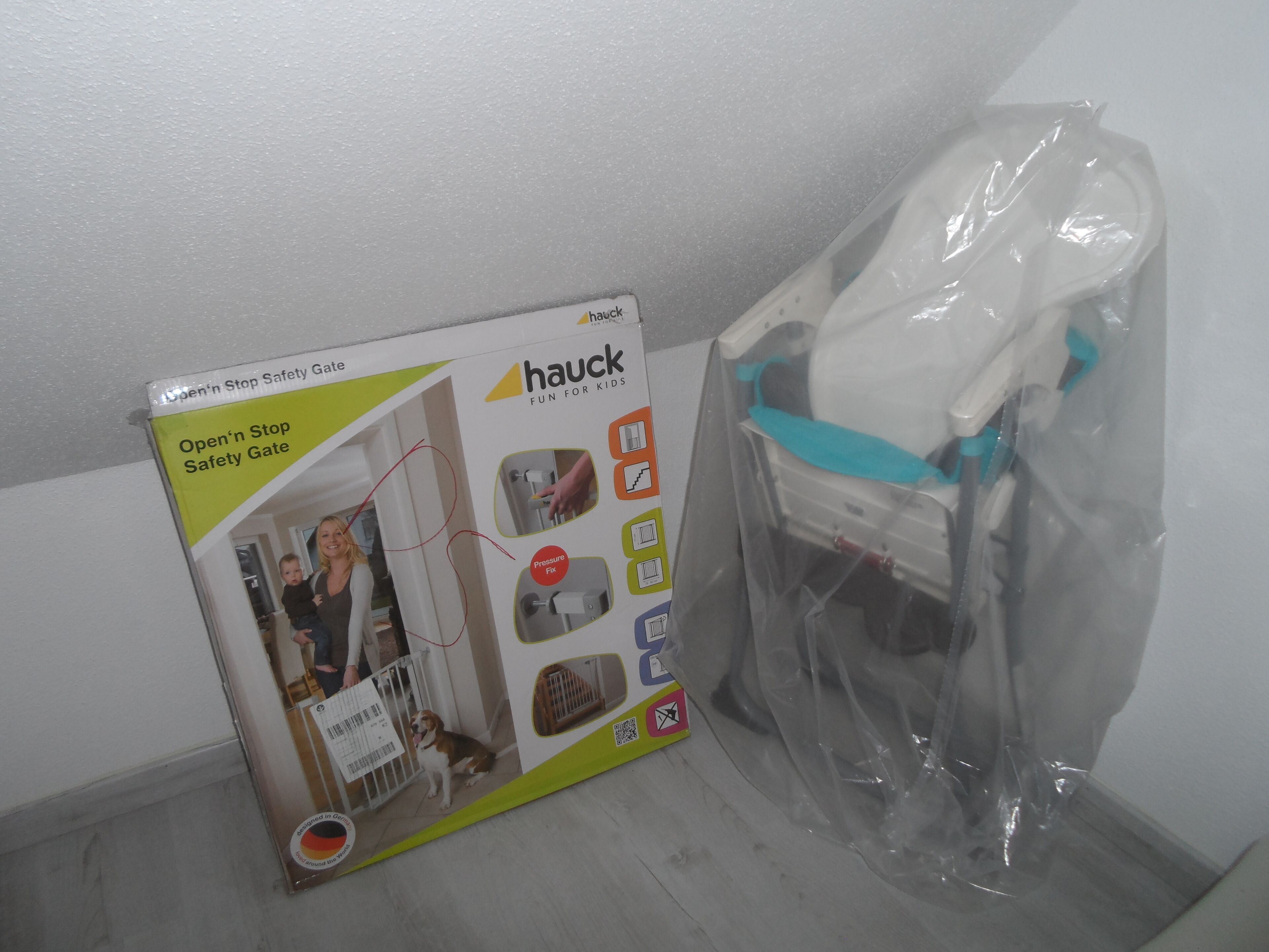 A box labeled 'hauck' with a 'Pressure Fix' feature, a 'German Made' badge, and a QR code.