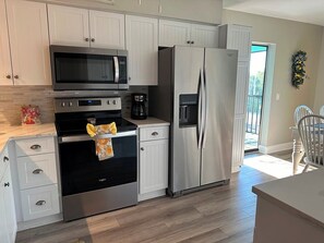 Fridge, microwave, dishwasher, coffee/tea maker