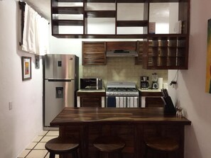 Fridge, microwave, oven, stovetop - - Best vacation rental location | Coco tropical condo - (Zona Hotelera Nte.)
