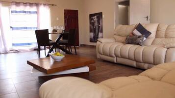 Business Apartment, Multiple Beds, Non Smoking, Kitchen | Living room | Flat-screen TV