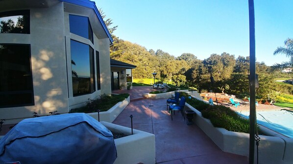 Enjoy the serene patio area with comfortable seating and beautiful views.
