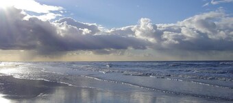 Bella casa vacanza con giardino con 3 camere da letto per 6 persone vicino alla spiaggia.