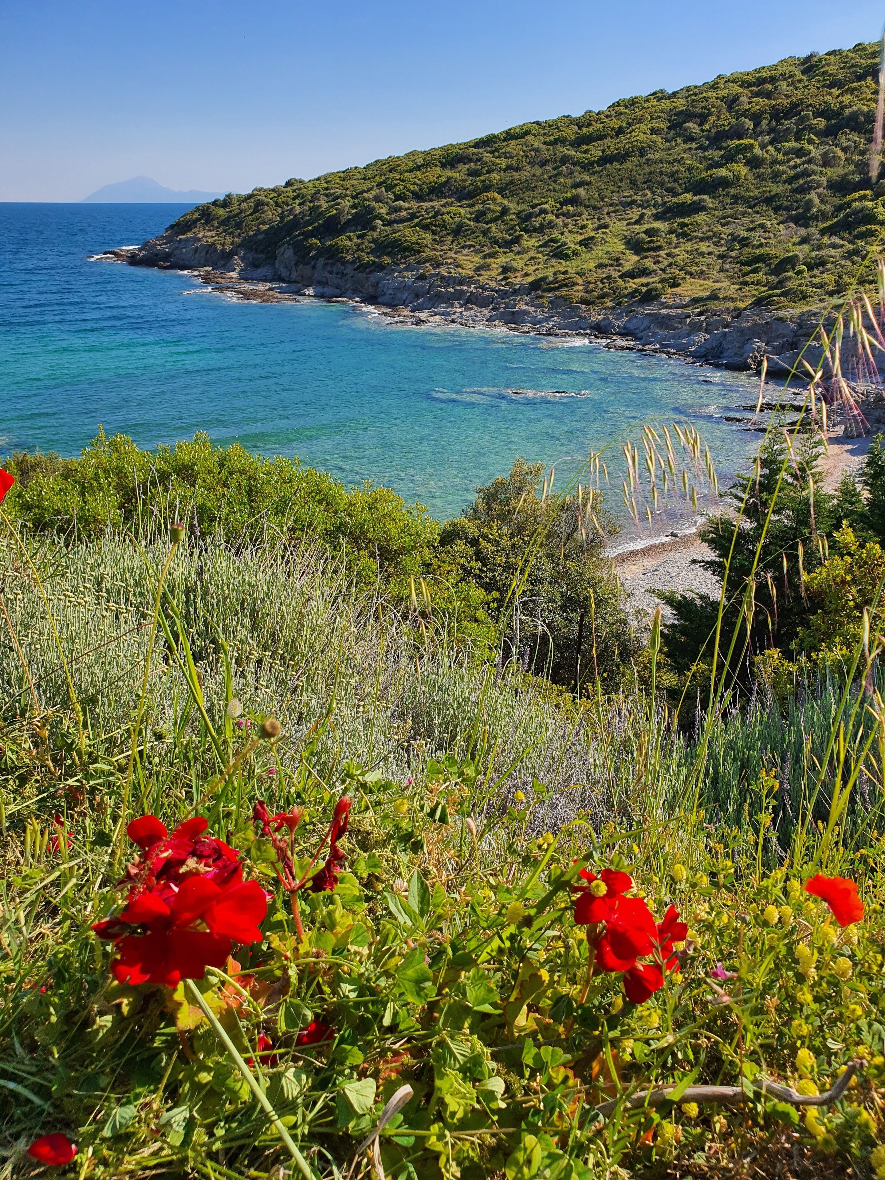 On the beach, sun-loungers, beach towels