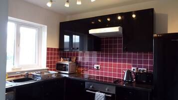 Leilighet, 1 soverom | Eget kjøkken | Kjøleskap, mikrobølgeovn, ovn og kokeplater