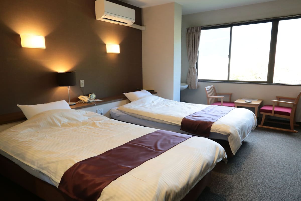 Twin Room, Non Smoking | In-room safe, desk, free WiFi, bed sheets