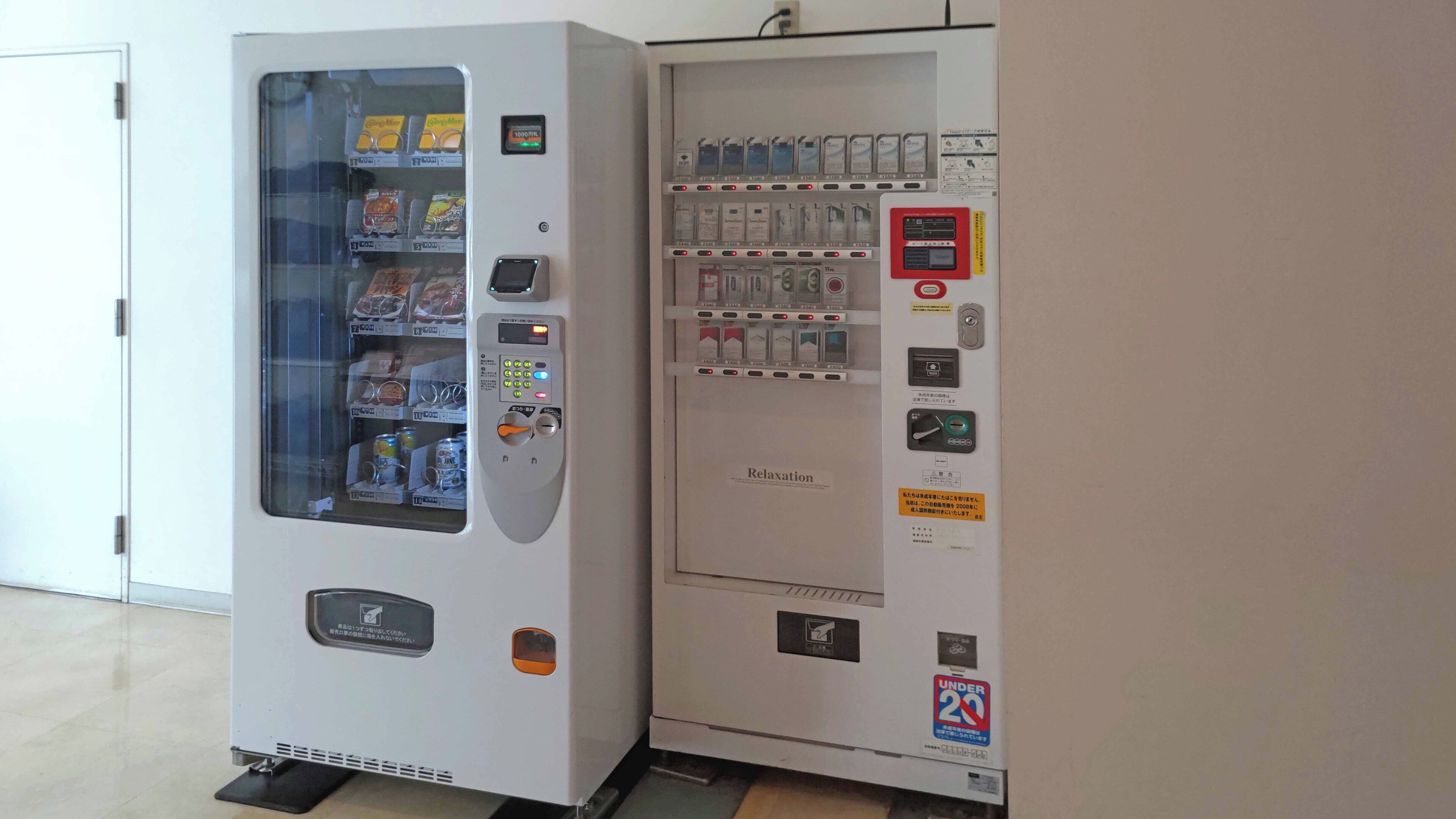 A vending machine with various items including snacks and beverages, and a sign indicating 'Relaxation'.