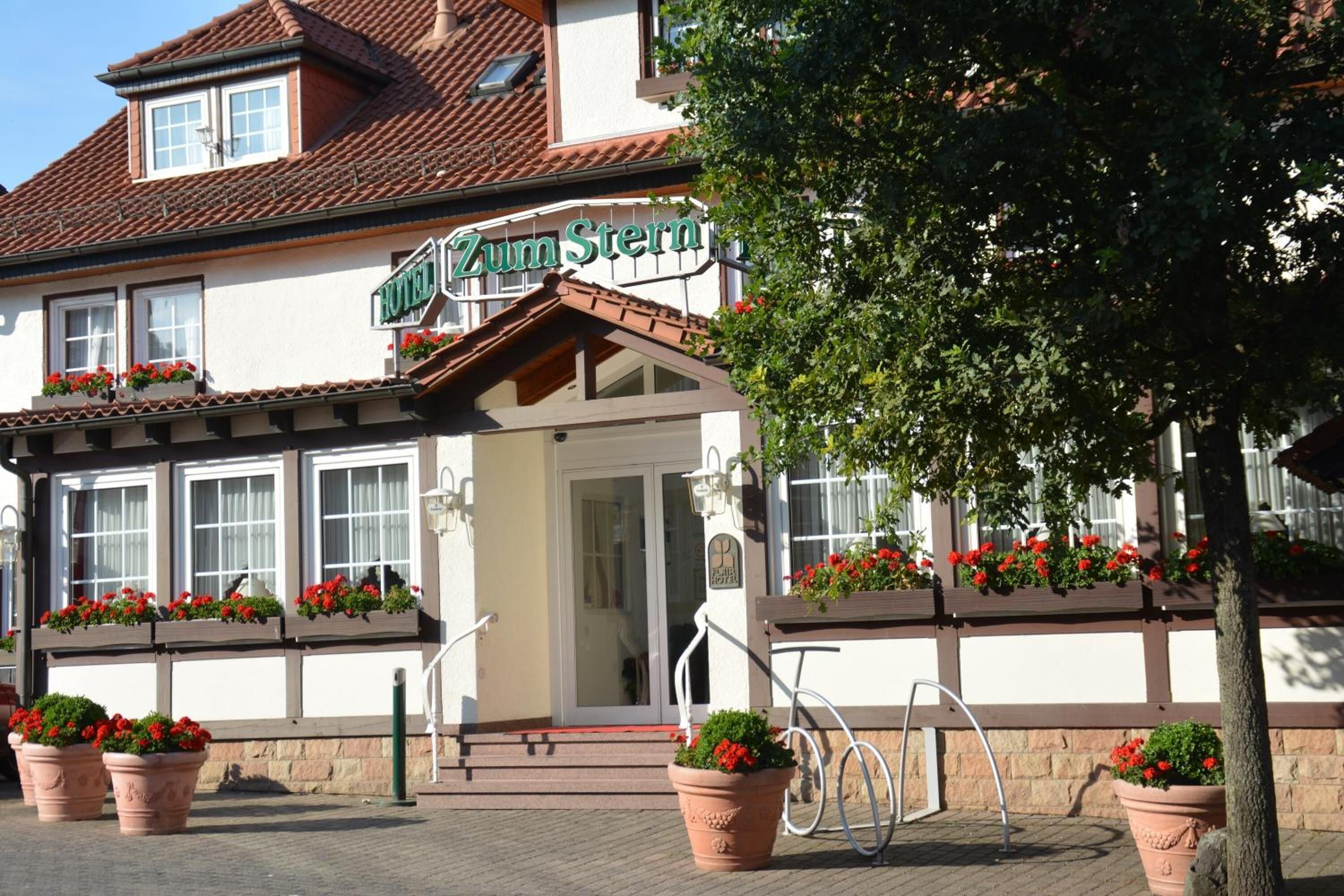 A traditional building with a sign reading "Zum Stern".