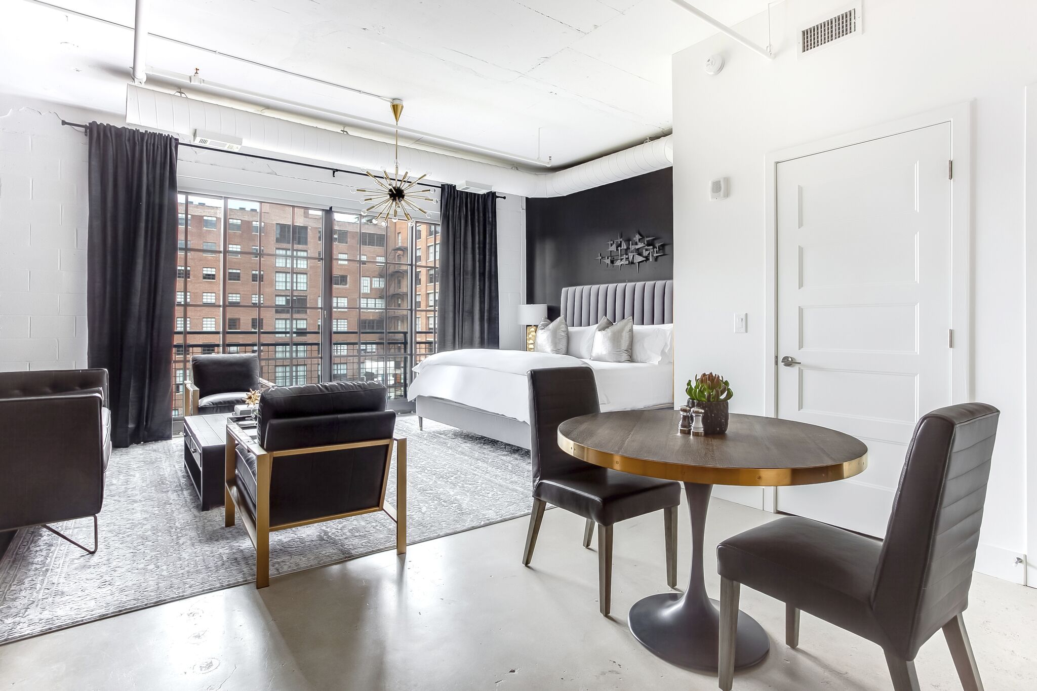 Living Area with City Views at Ponce Market Apartment