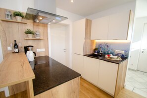 Fridge, microwave, dishwasher, coffee/tea maker