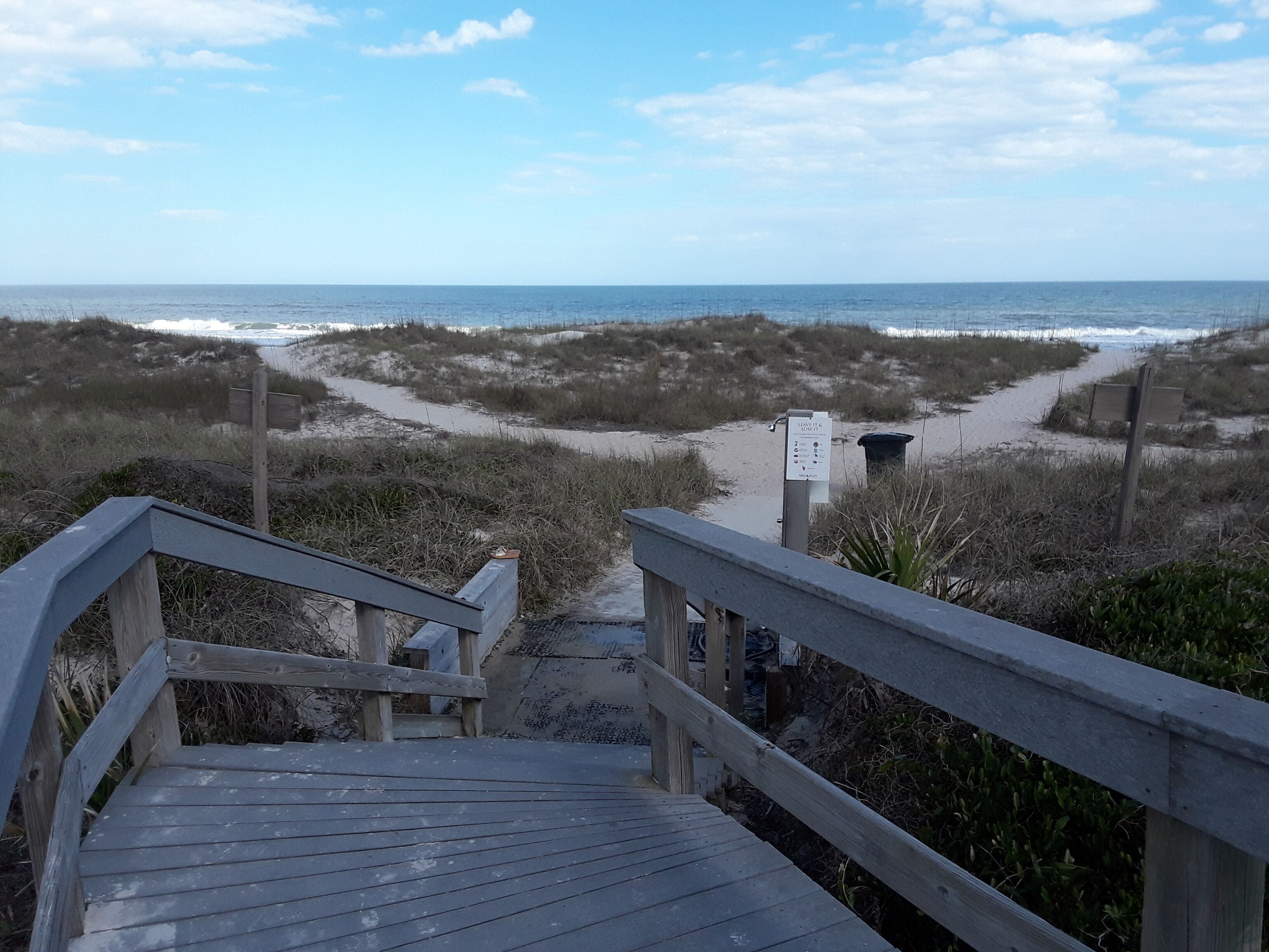On the beach, sun loungers, beach towels
