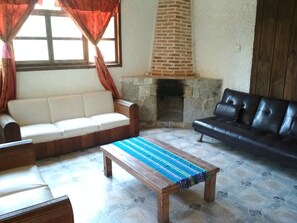 쿼드룸, 침대(여러 개), 정원 전망 | 거실