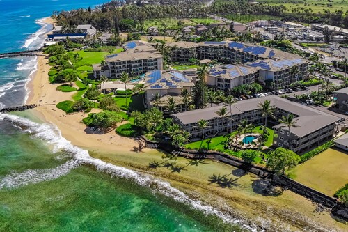 Waterfront condo on the ground floor with a pool, ocean views & beach access