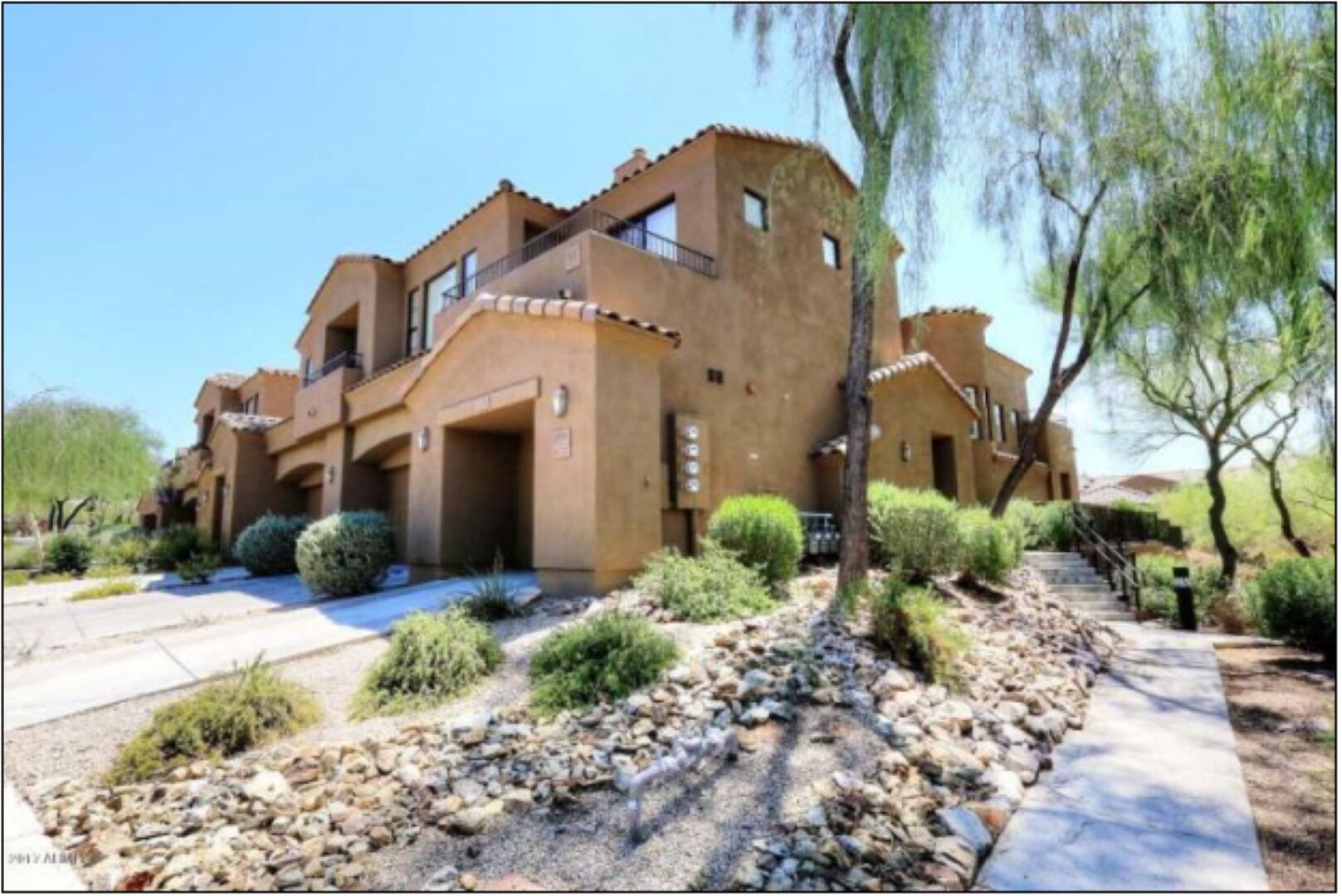 GATED UPGRADED CONDO IN HIGHLY DESIRABLE SCOTTSDALE LOCATION