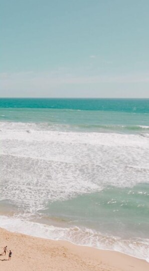 On the beach, sun-loungers, beach towels