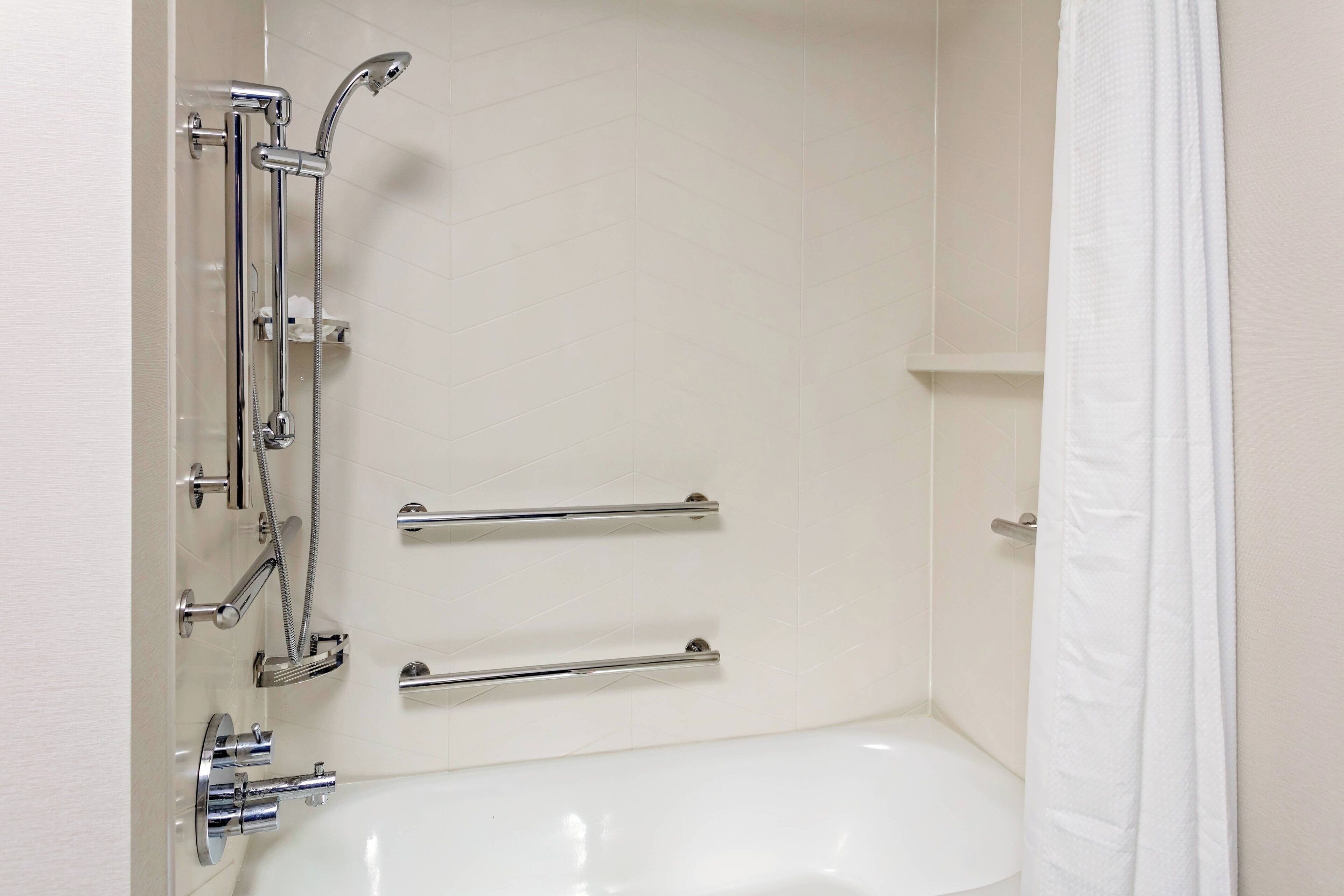 combined shower/bathtub, free toiletries, hair dryer, towels