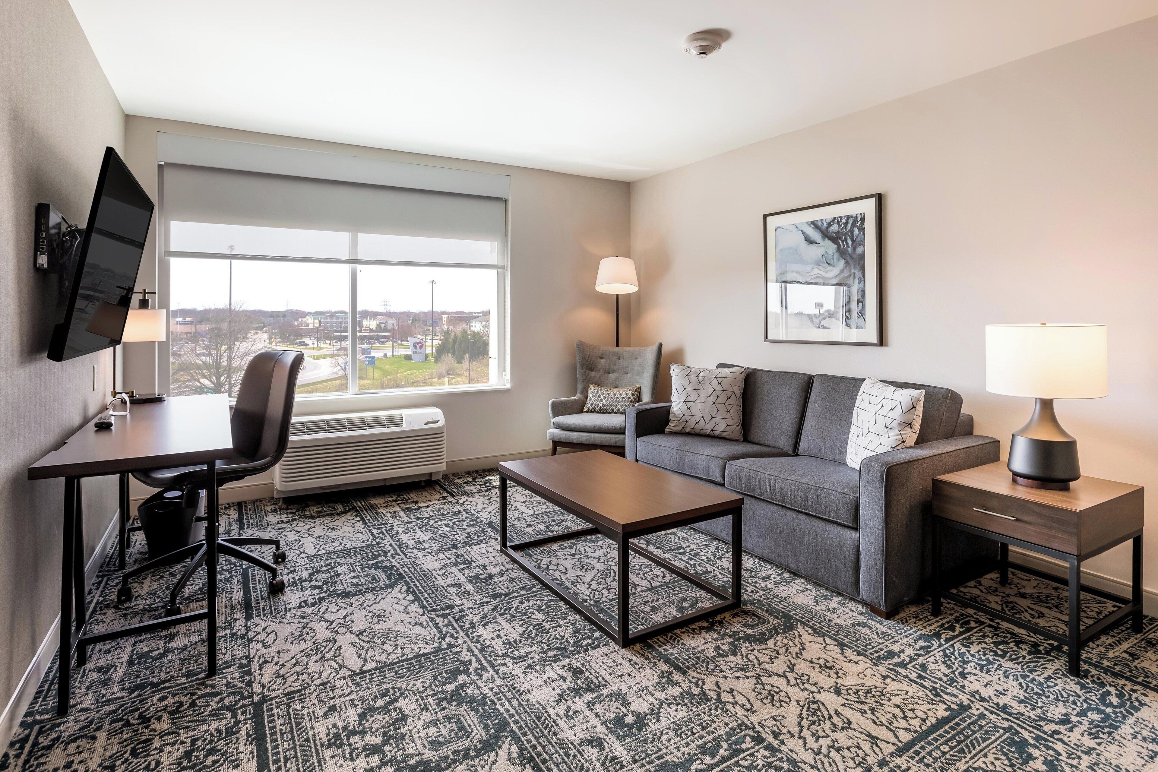 suite, 1 king bed with sofa bed, city view | 1 bedroom, premium bedding, desk, laptop workspace