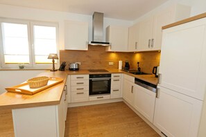 Fridge, oven, dishwasher, coffee/tea maker