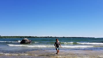 On the beach, sun-loungers, beach towels