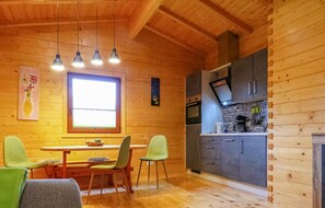 Fridge, stovetop, dishwasher, coffee/tea maker