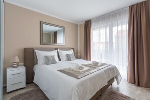 2 slaapkamers, een kluis op de kamer, een strijkplank/strijkijzer