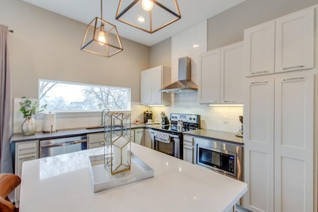 Fridge, microwave, oven, stovetop. Urban Retreat | Rooftop Views | Walk to Downtown