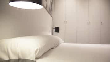 2 dormitorios, caja fuerte, tabla de planchar con plancha y wifi gratis