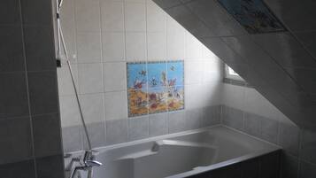 Bathtub, hair dryer