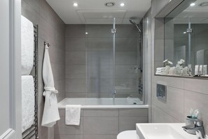 Hair dryer, towels, soap, shampoo
