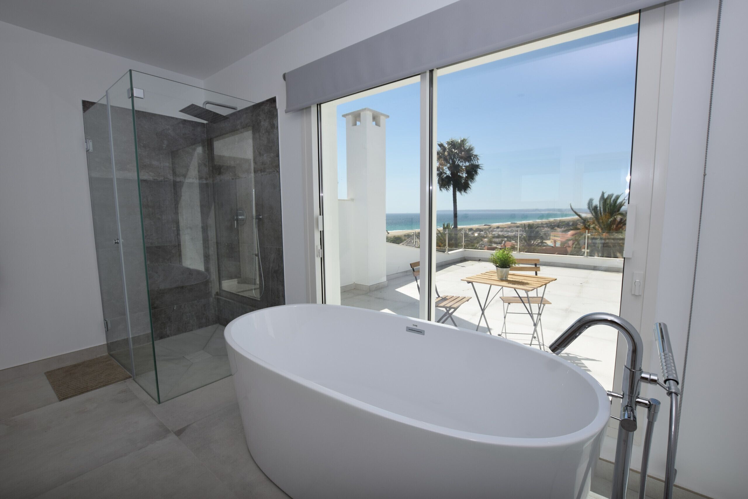 Bathtub, hair dryer, towels