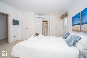4 slaapkamers, een strijkplank/strijkijzer, gratis wifi