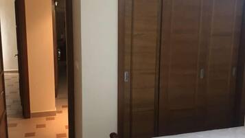 Blackout curtains, iron/ironing board