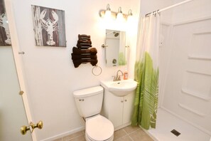 Bathtub, hair dryer, towels
