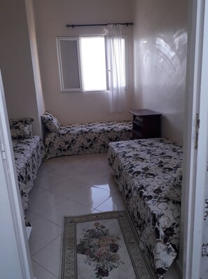 3 quartos, ferros/tábuas de passar roupa, Wi-Fi, roupa de cama