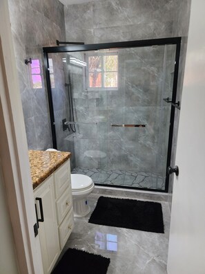 Bathtub, hair dryer, towels - PENTHOUSE VIEW AND FLATS VACATION HOME (#1) (Montego Bay, St James)