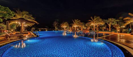 Outdoor pool, open 6:00 AM to 6:00 PM, pool umbrellas, pool loungers